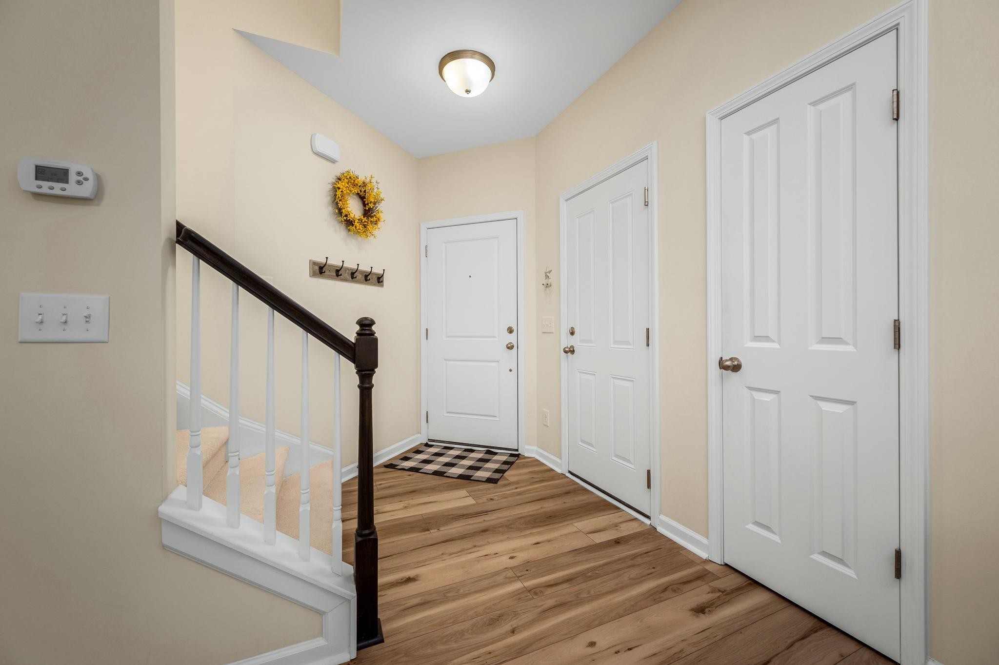 5003 Hemlock Court Spring Hill, TN 37174 - Photo 14 of 32 a view of a hallway with wooden floor and entryway