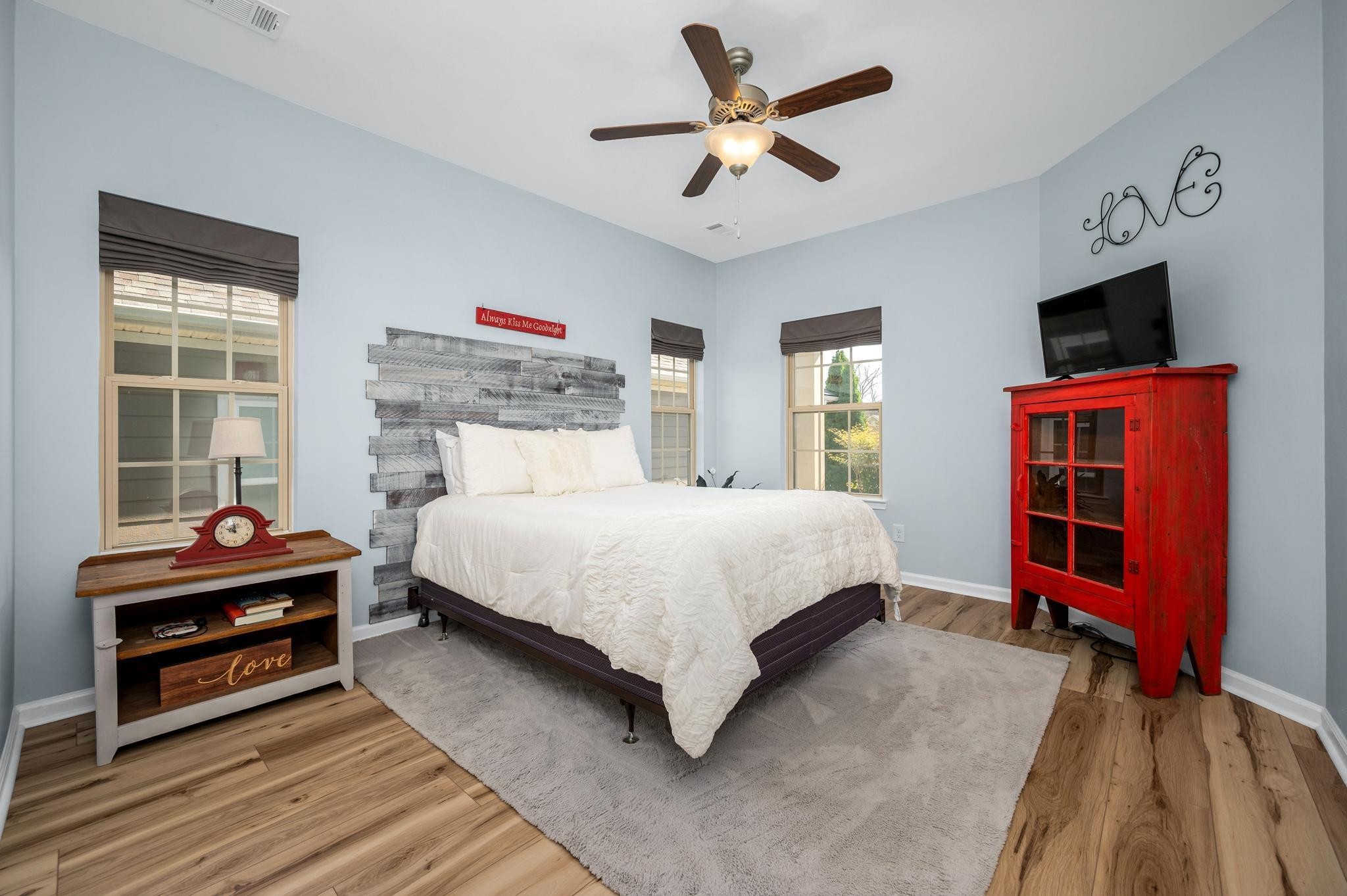 5003 Hemlock Court Spring Hill, TN 37174 - Photo 15 of 32 a bedroom with a bed and a tv on the dresser