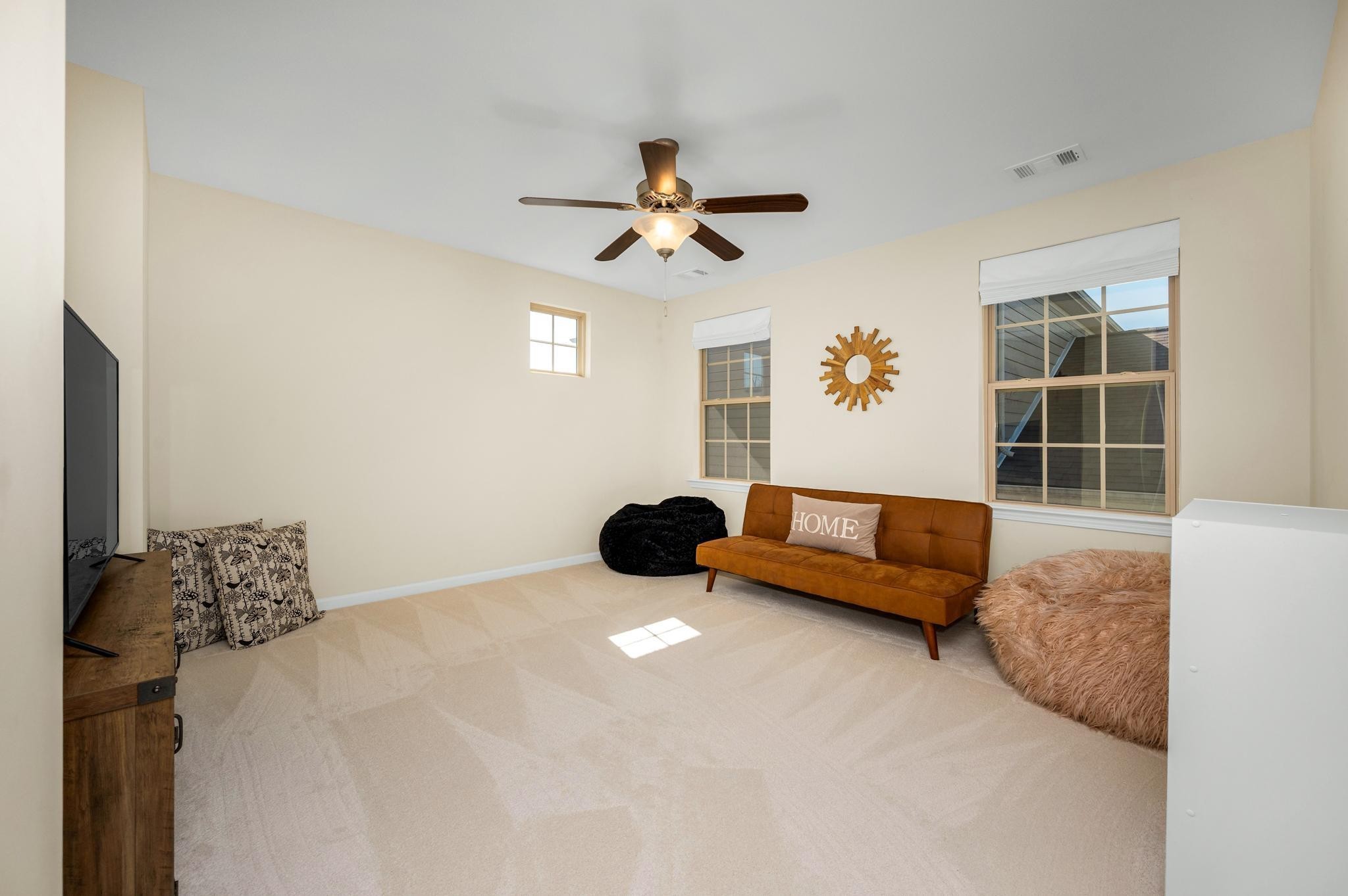 5003 Hemlock Court Spring Hill, TN 37174 - Photo 19 of 32 a bedroom with furniture and a ceiling fan