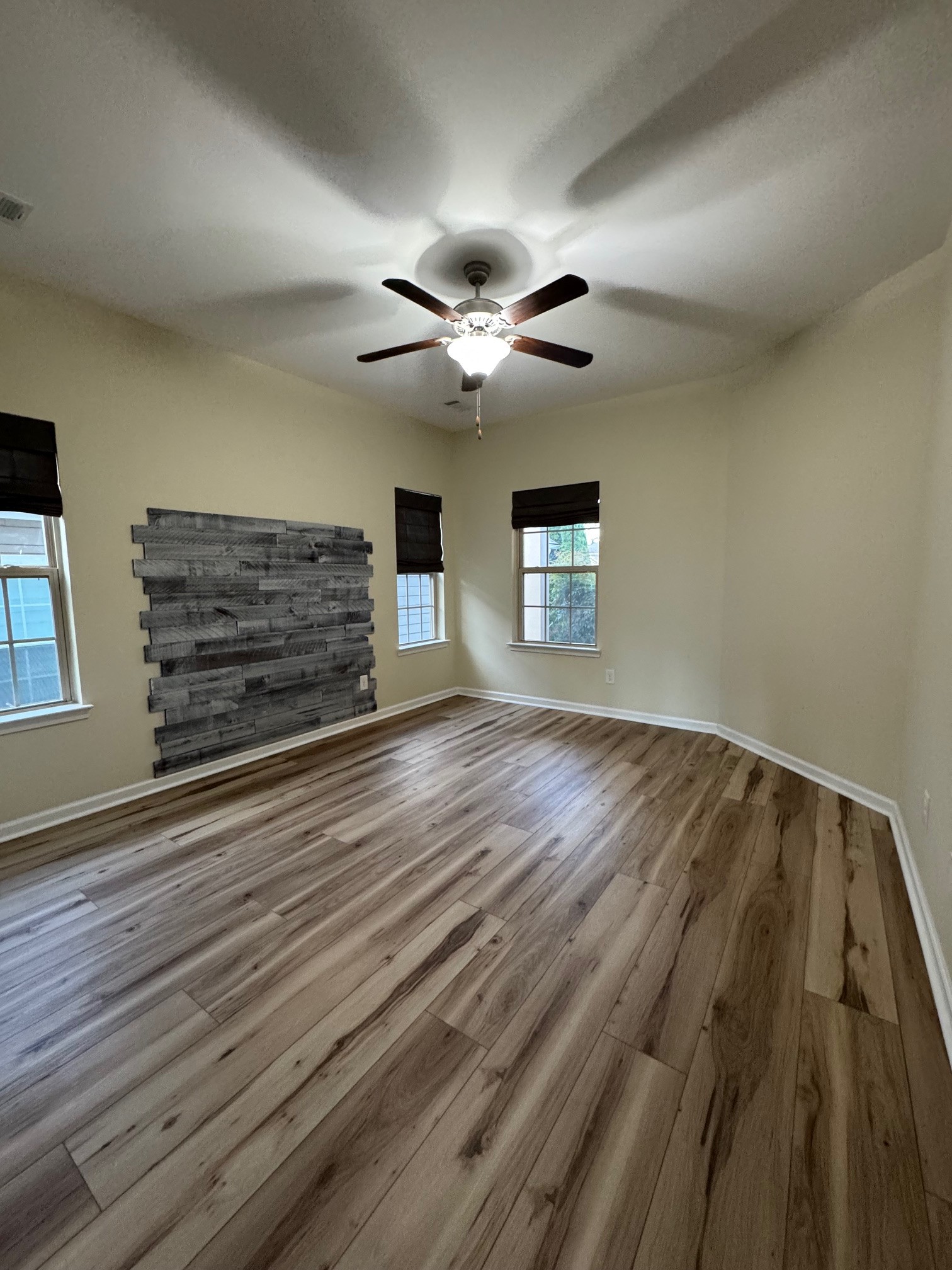 5003 Hemlock Court Spring Hill, TN 37174 - Photo 21 of 32 wooden floor in an empty room with a window