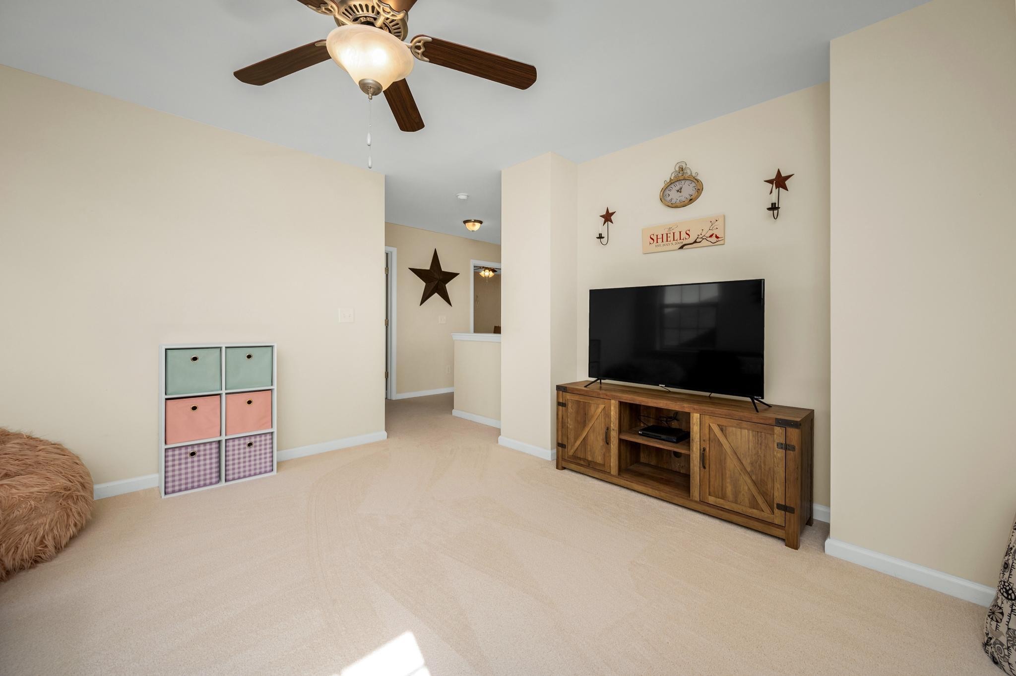 5003 Hemlock Court Spring Hill, TN 37174 - Photo 22 of 32 a living room with furniture and a flat screen tv