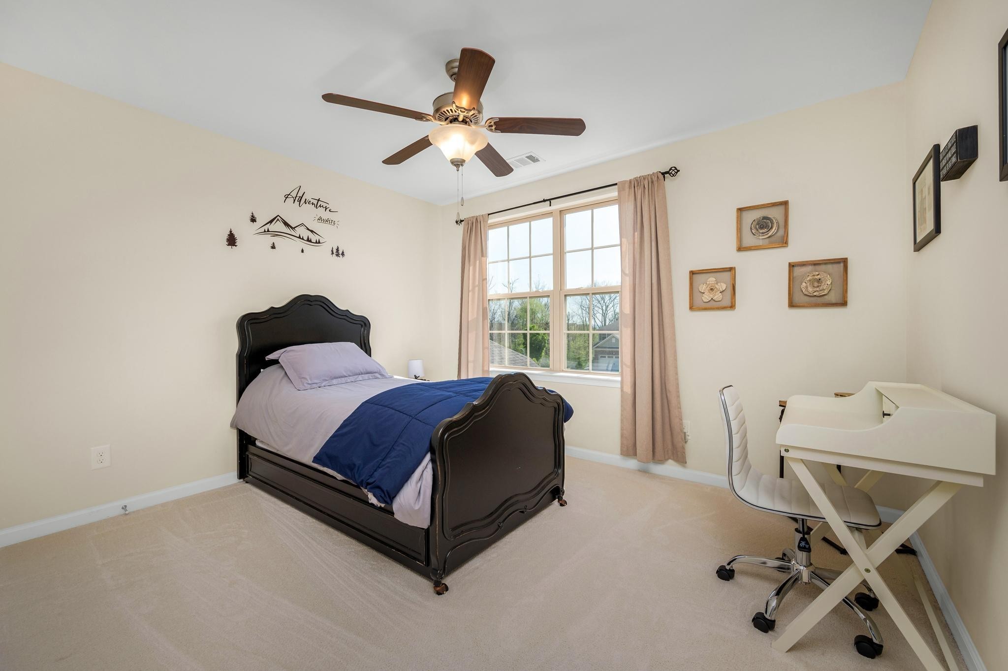 5003 Hemlock Court Spring Hill, TN 37174 - Photo 24 of 32 a spacious bedroom with a bed and a chandelier