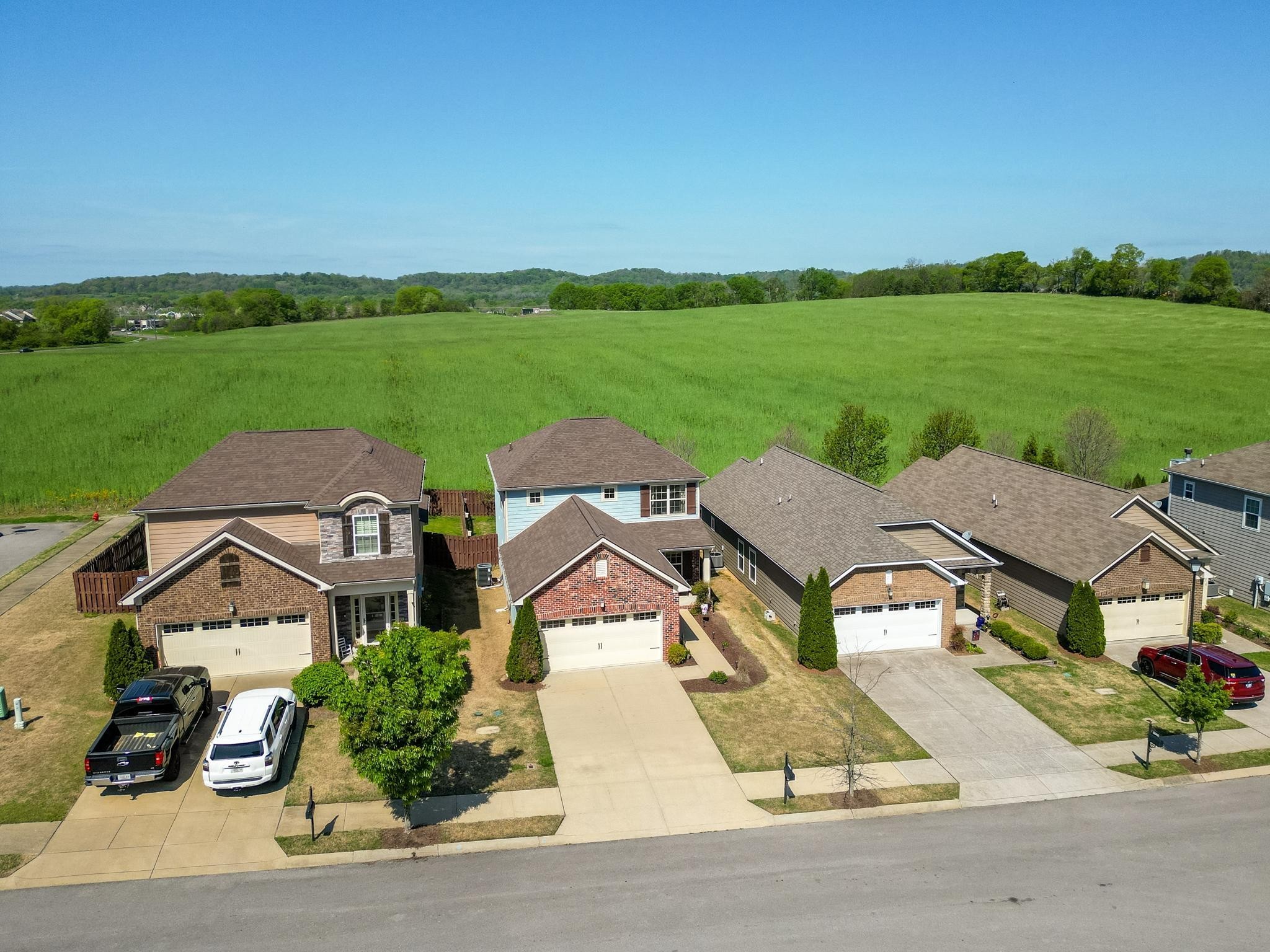 5003 Hemlock Court Spring Hill, TN 37174 - Photo 29 of 32 an aerial view of a house with garden space and street view