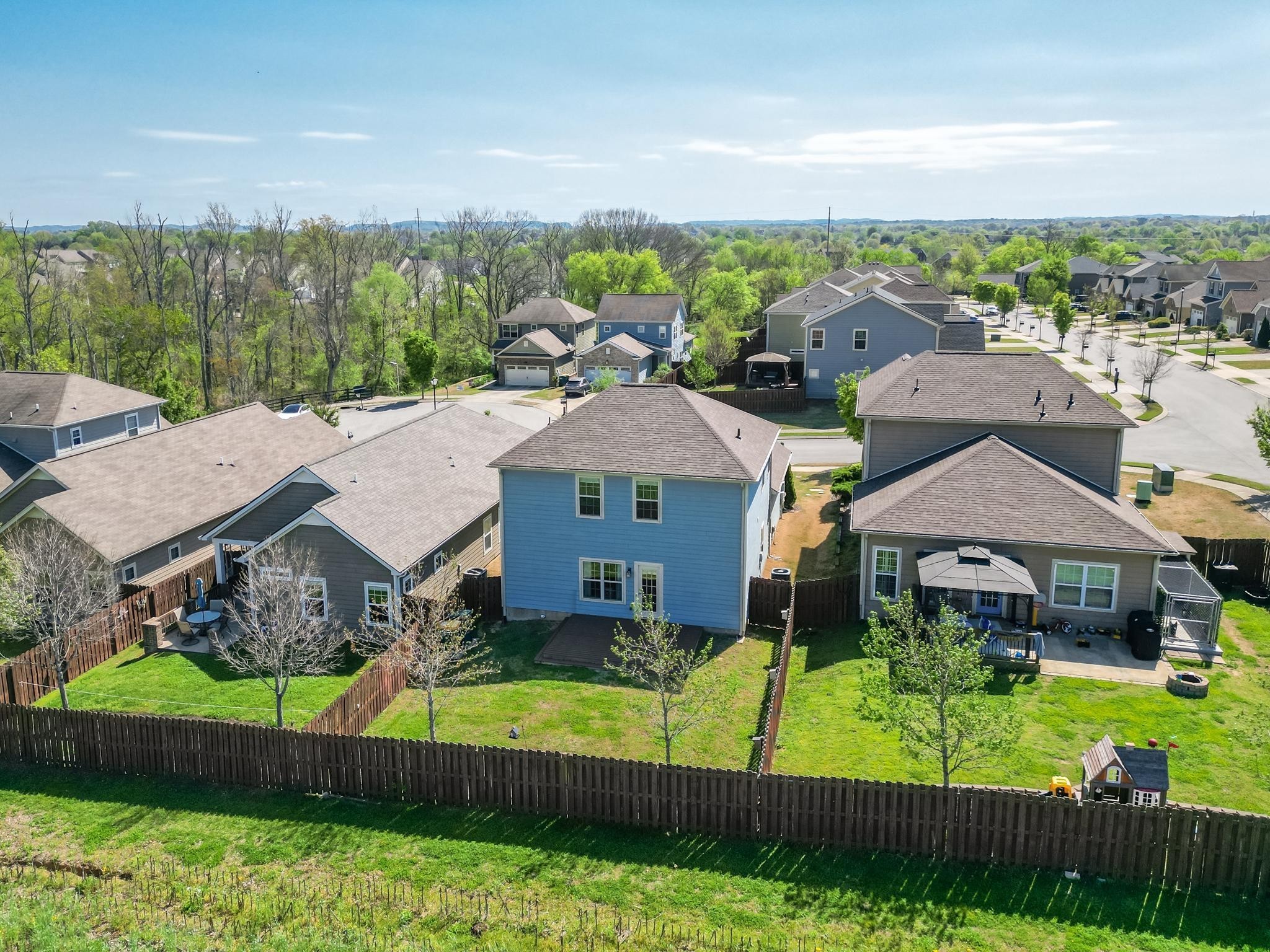 5003 Hemlock Court Spring Hill, TN 37174 - Photo 30 of 32 a aerial view of a house with swimming pool and a yard
