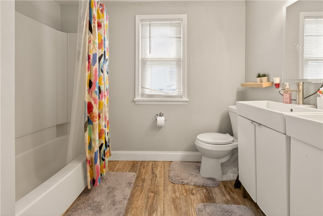 147 Wood Road Greece, NY 14626 - Photo 14 of 26 Full bathroom (1st-floor) with newer shower/tub &