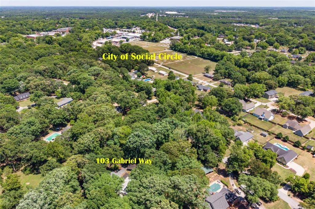 103 Gabriel Way Social Circle, GA 30025 - Photo 3 of 70 an aerial view of a houses with a yard