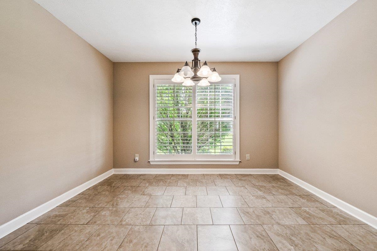 583 Rosemark Road Atoka, TN 38004 - Photo 8 of 25 a view of an empty room with a window