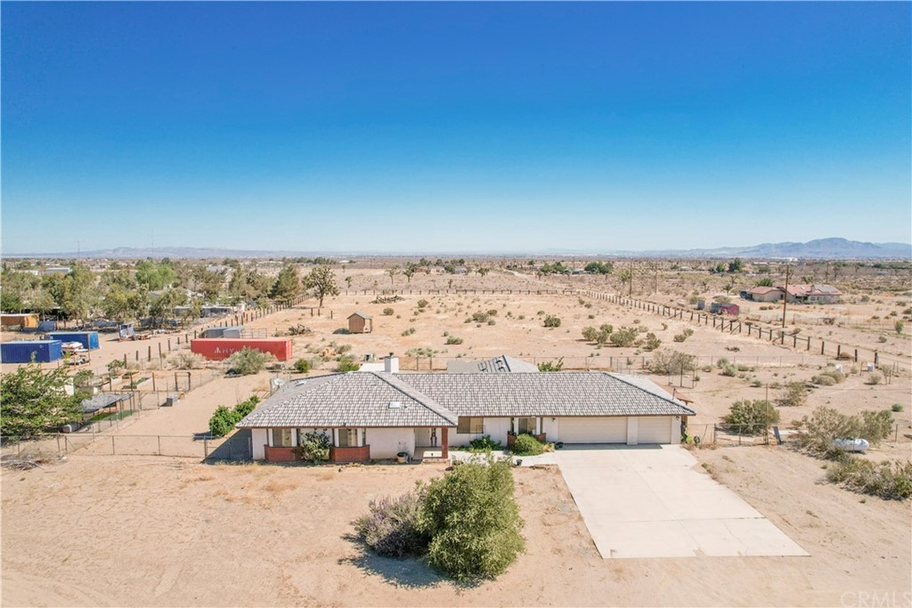 11450 Verbena Road Phelan, CA 92371 - Photo 1 of 1 an aerial view of residential houses with outdoor space