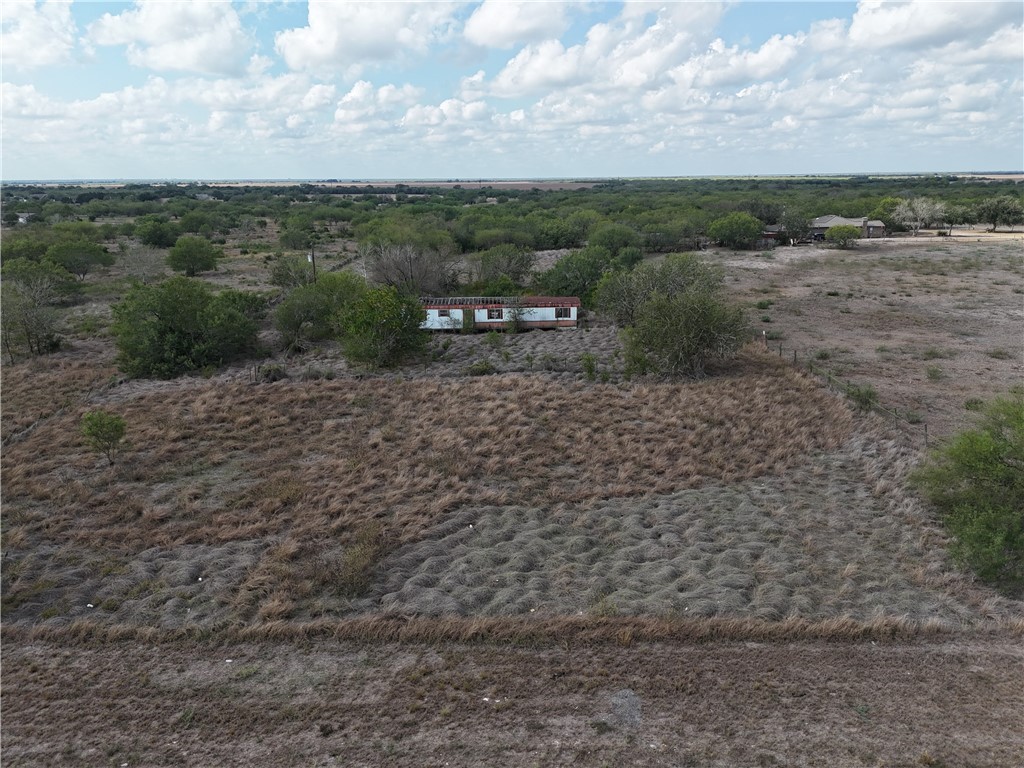 0 Fm Road Robstown, TX 78380 - Photo 12 of 20 a view of a dry yard with trees
