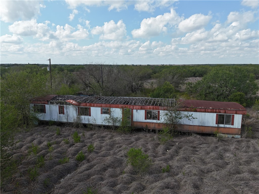 0 Fm Road Robstown, TX 78380 - Photo 16 of 20 a view of a house with a yard