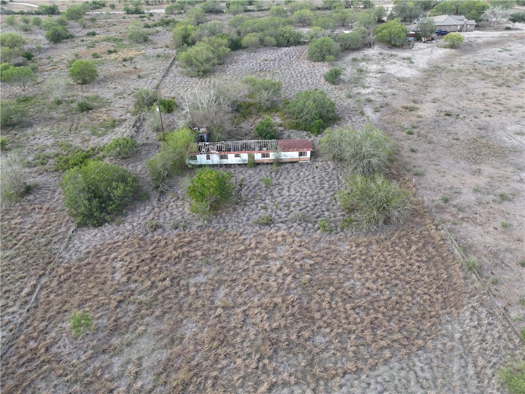 0 Fm Road Robstown, TX 78380 - Photo 2 of 20 a view of a dry yard with trees