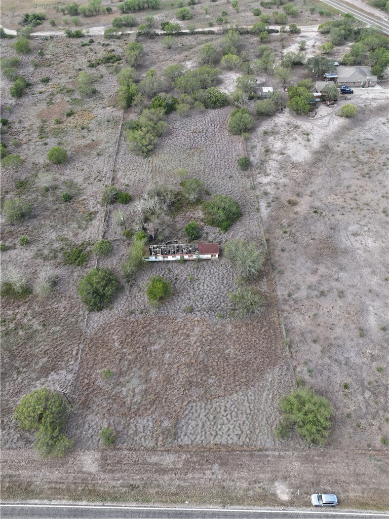 0 Fm Road Robstown, TX 78380 - Photo 4 of 20 a view of a dry yard with green space