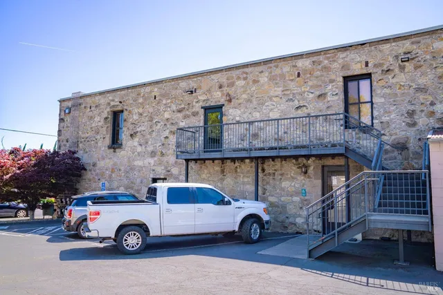 a car parked in front of a building