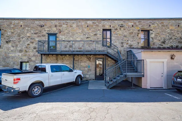 a car parked on the side of a building