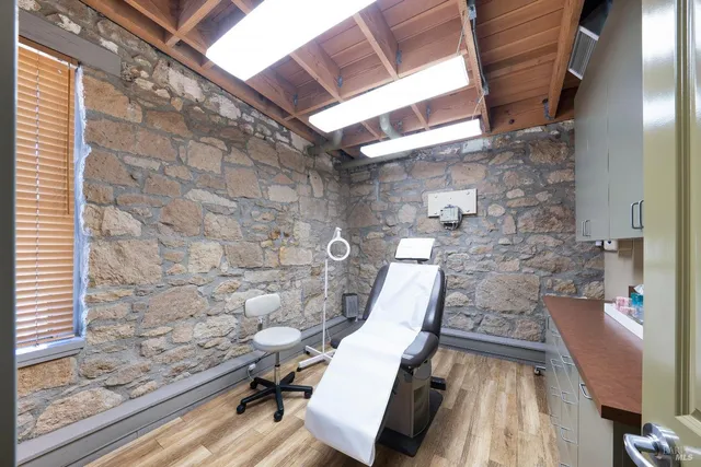 a view of entryway with wooden floor