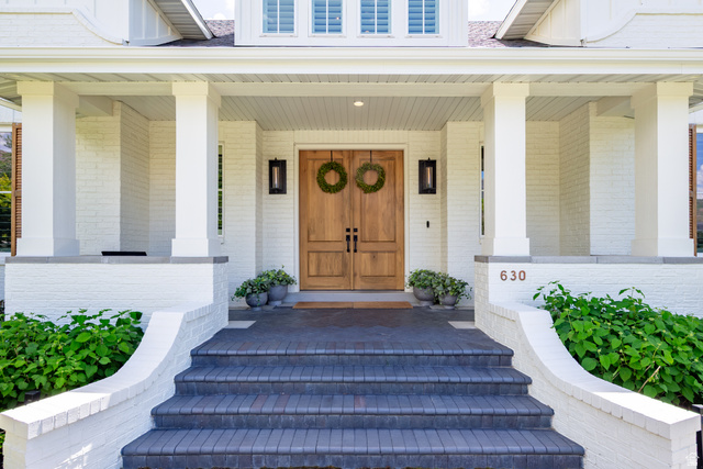 630 East Center Street Alpine, UT 84004 - Photo 7 of 115 Inviting entry with double wood doors and painted brick facade