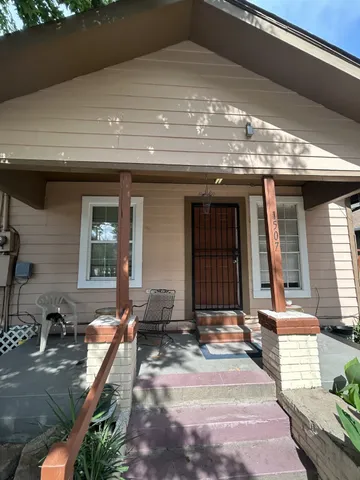 a view of house with garage and