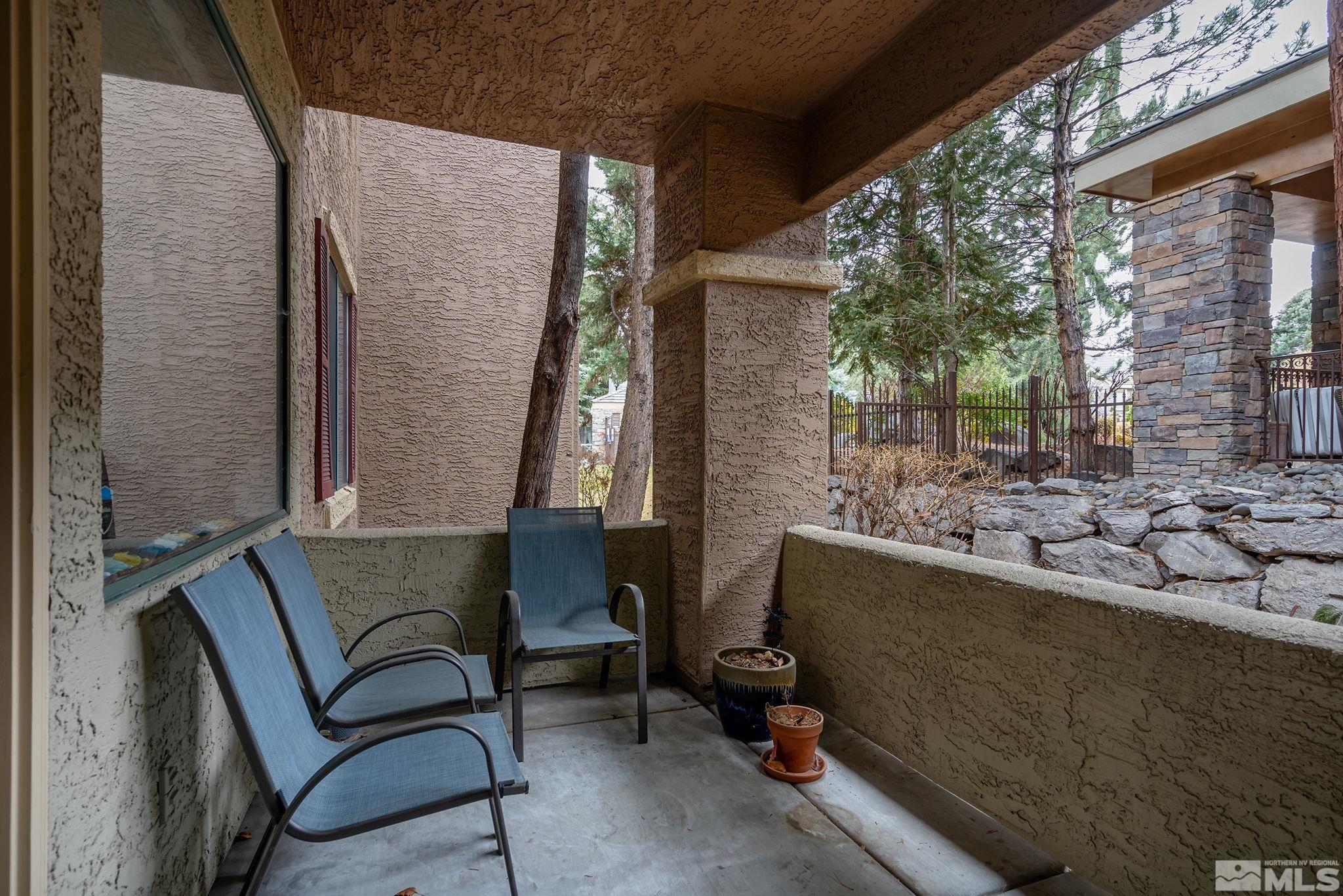 900 South Meadows Parkway, Unit 2012 Reno, NV 89521 - Photo 14 of 17 a view of backyard with outdoor seating and plants