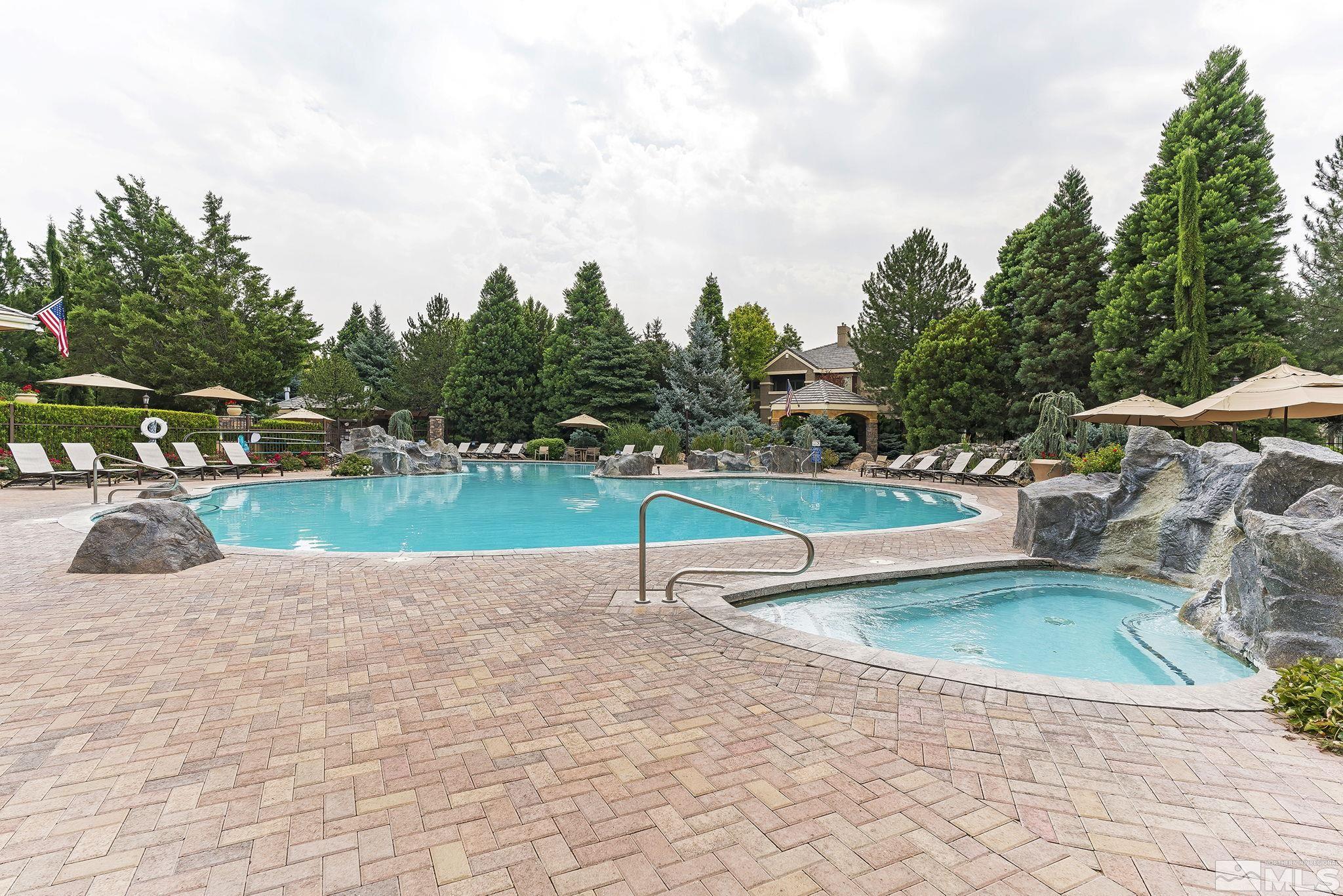 900 South Meadows Parkway, Unit 2012 Reno, NV 89521 - Photo 16 of 17 a view of outdoor space yard swimming pool and green space