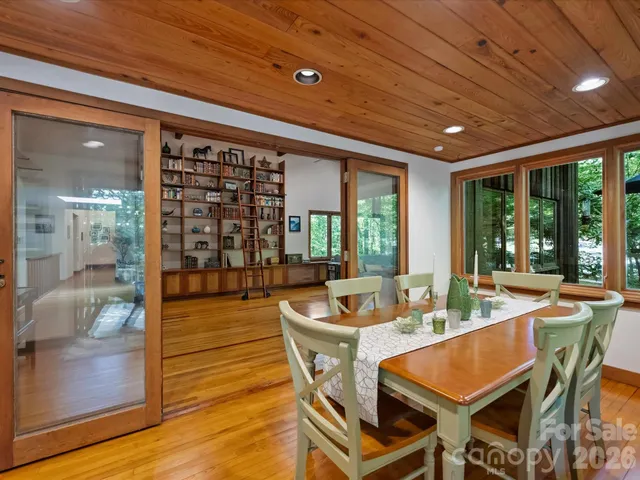 a kitchen with stainless steel appliances granite countertop a stove and a refrigerator