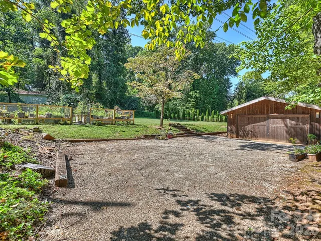 a view of a garden with an outdoor space