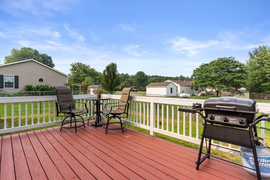 114 Lafayette Road Salisbury, MA 01952 - Photo 2 of 24 a view of a balcony with wooden floor and outdoor seating