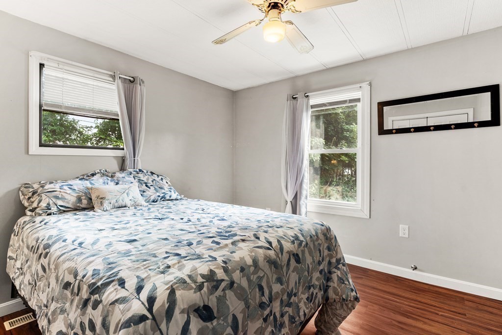 114 Lafayette Road Salisbury, MA 01952 - Photo 7 of 24 a bedroom with a bed and a window