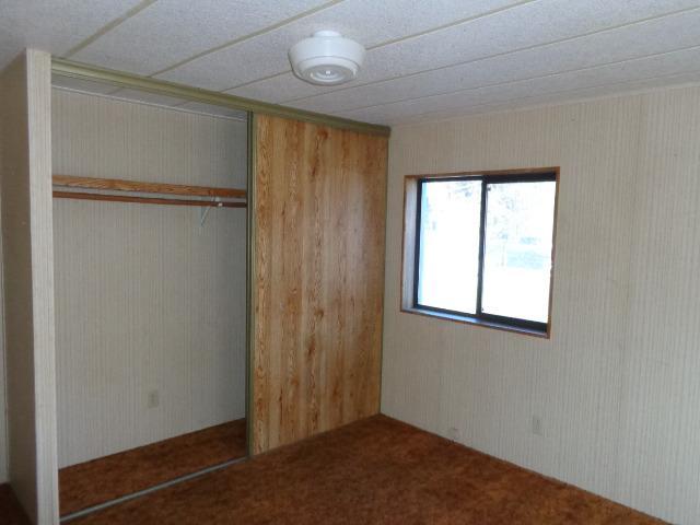 14220 Upper Applegate Road Jacksonville, OR 97530 - Photo 11 of 19 an empty room with windows