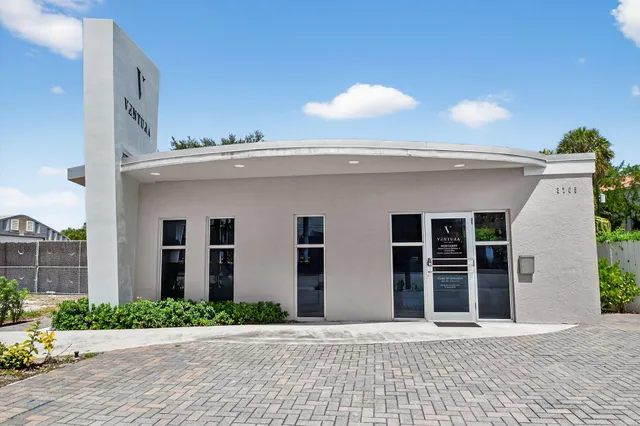 a view of a building with a window and door