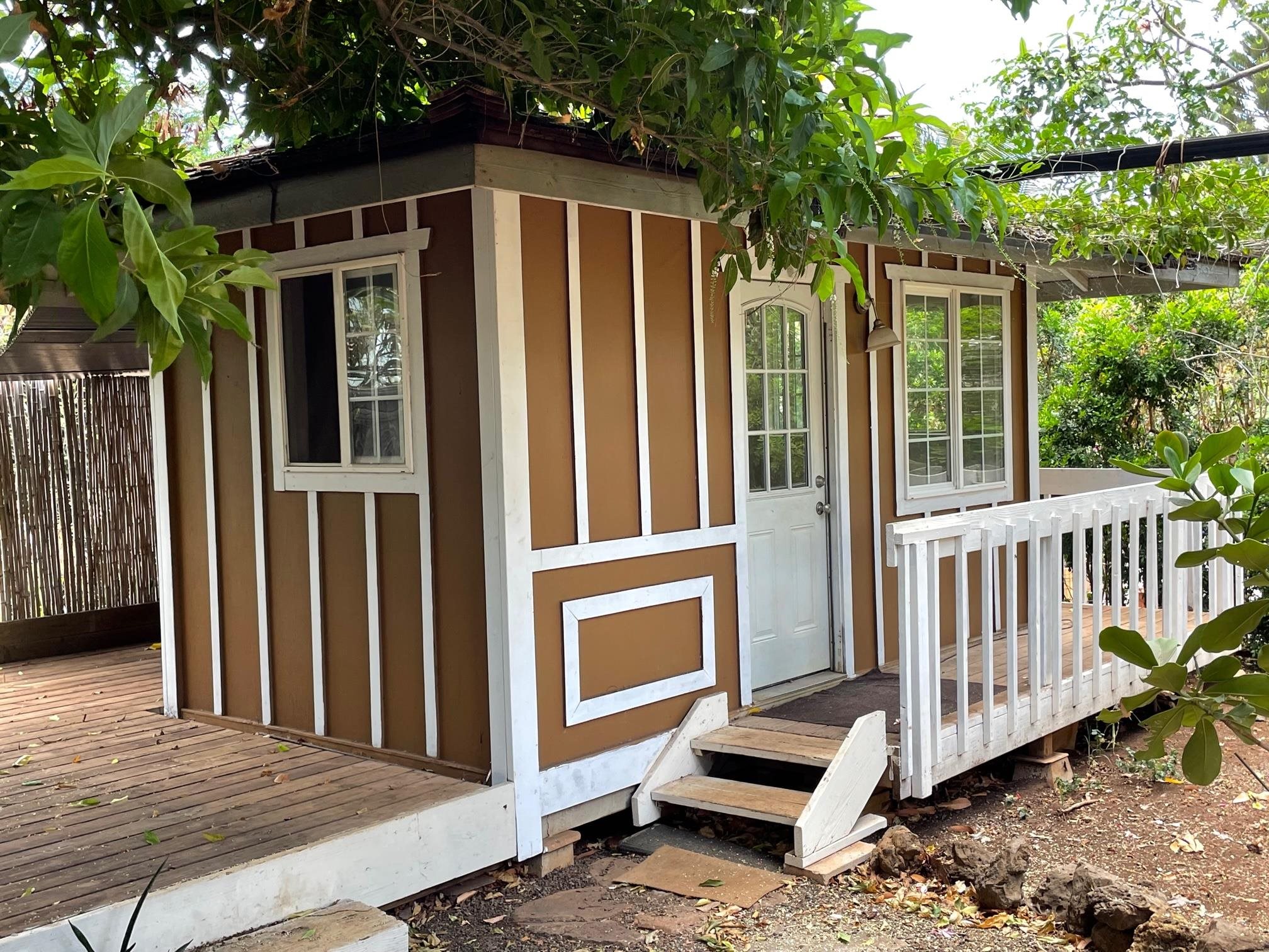 182 Mehani Circle Kihei, HI 96753 - Photo 3 of 4 a view of a house with a porch and wooden floor