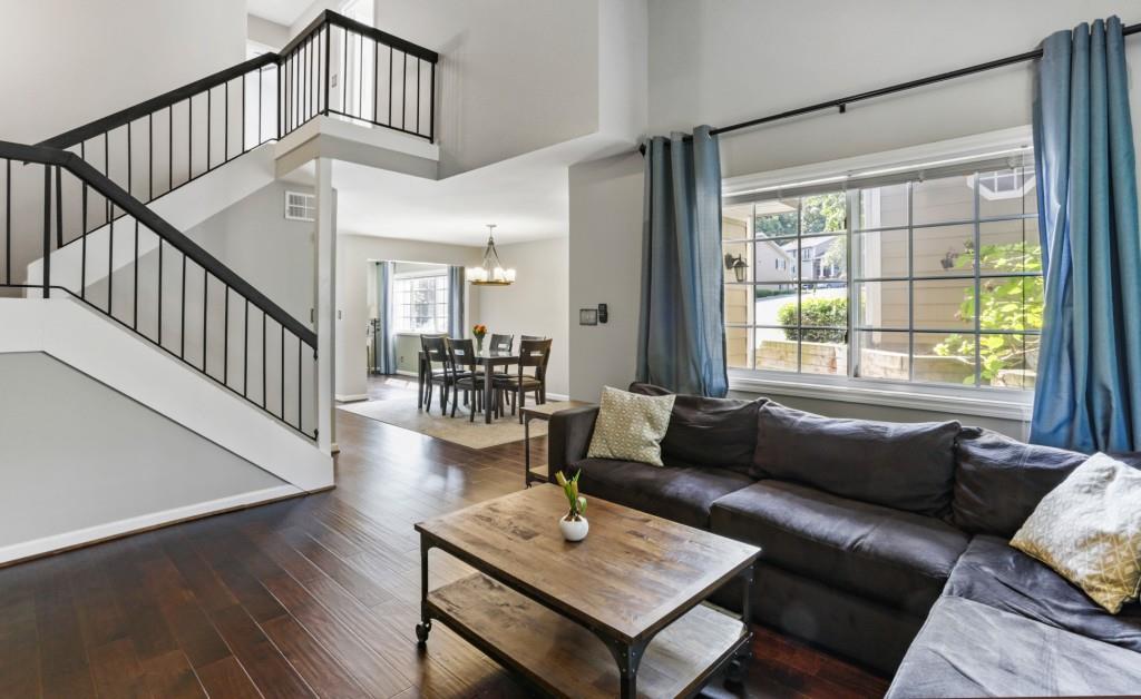 a living room with furniture and a table