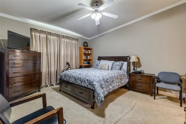 a bedroom with a bed and furniture