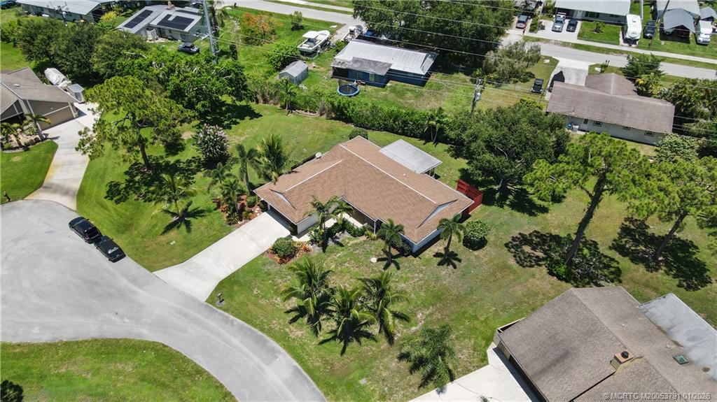 2916 Southeast Paramount Place Stuart, FL 34997 - Photo 36 of 38 an aerial view of a house with a yard