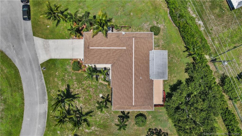 2916 Southeast Paramount Place Stuart, FL 34997 - Photo 38 of 38 an aerial view of a yard