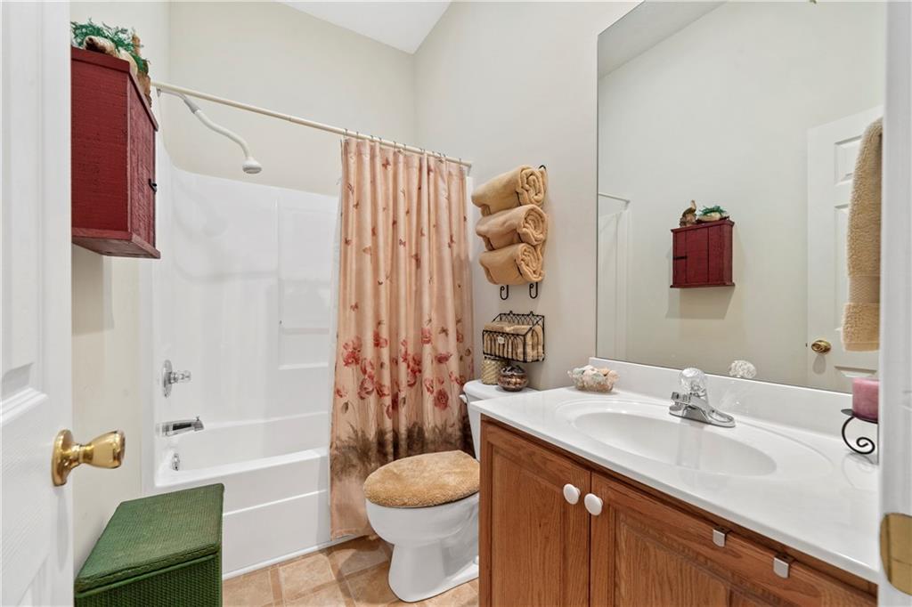 125 Lowe Road Northwest Milledgeville, GA 31061 - Photo 14 of 62 a bathroom with a sink and a mirror