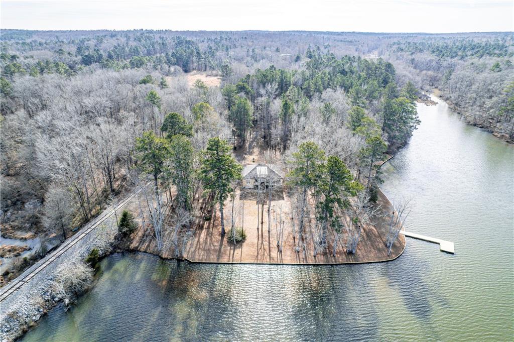 125 Lowe Road Northwest Milledgeville, GA 31061 - Photo 2 of 73 a view of a lake from a balcony