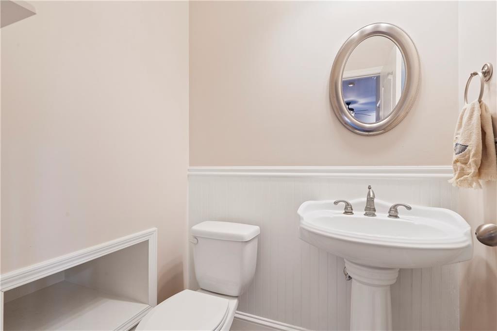 125 Lowe Road Northwest Milledgeville, GA 31061 - Photo 29 of 62 a bathroom with a sink and a mirror
