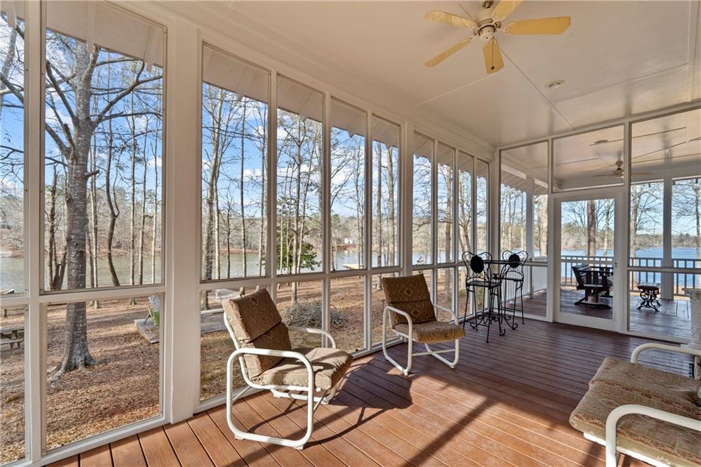 125 Lowe Road Northwest Milledgeville, GA 31061 - Photo 29 of 73 a view of a livingroom with furniture and floor to ceiling window