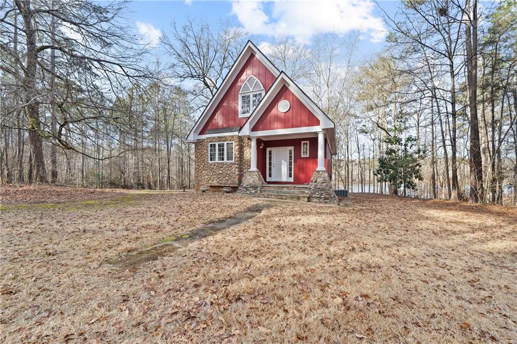 125 Lowe Road Northwest Milledgeville, GA 31061 - Photo 8 of 73 a front view of house with yard and green space