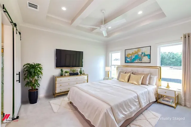 a view of an outdoor space with furniture and garden