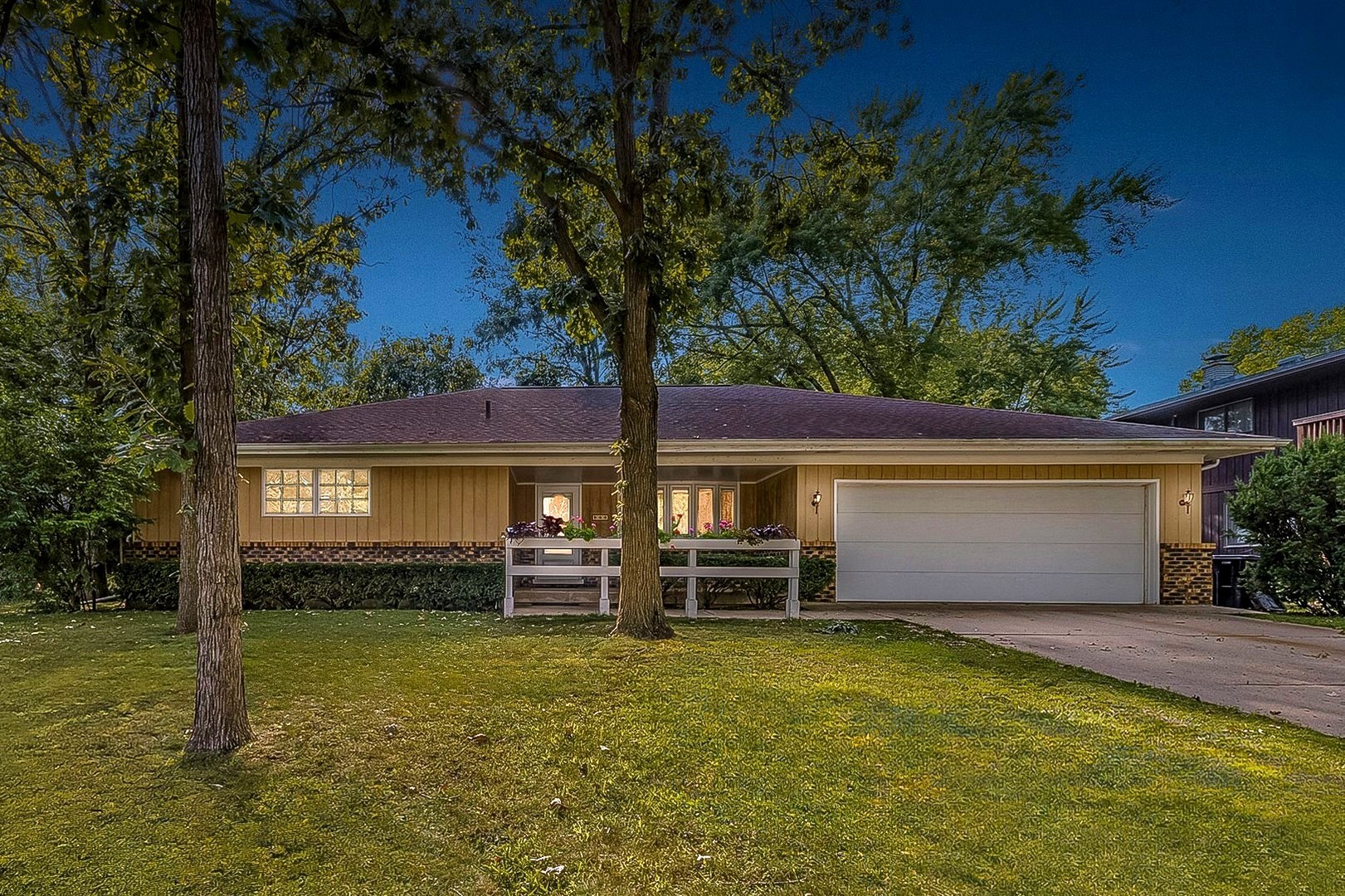 front view of a house with a yard
