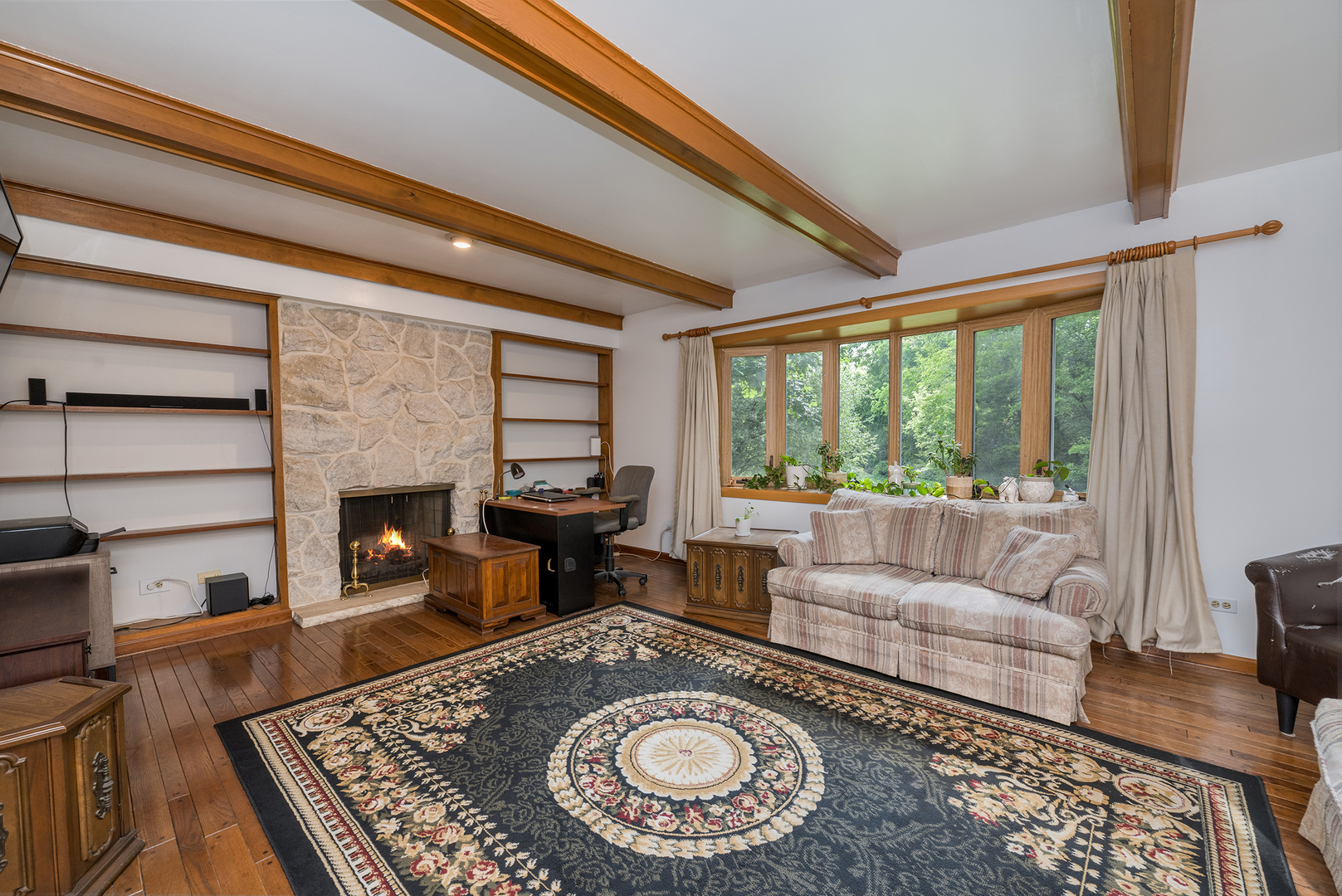 900 Ruth Drive Elgin, IL 60123 - Photo 4 of 25 a living room with furniture and a fireplace