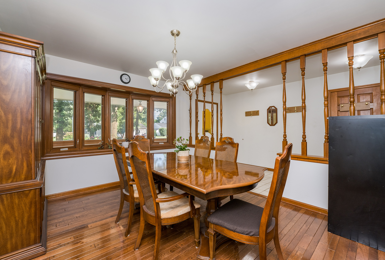 900 Ruth Drive Elgin, IL 60123 - Photo 9 of 25 a view of a dining room with furniture window and wooden floor