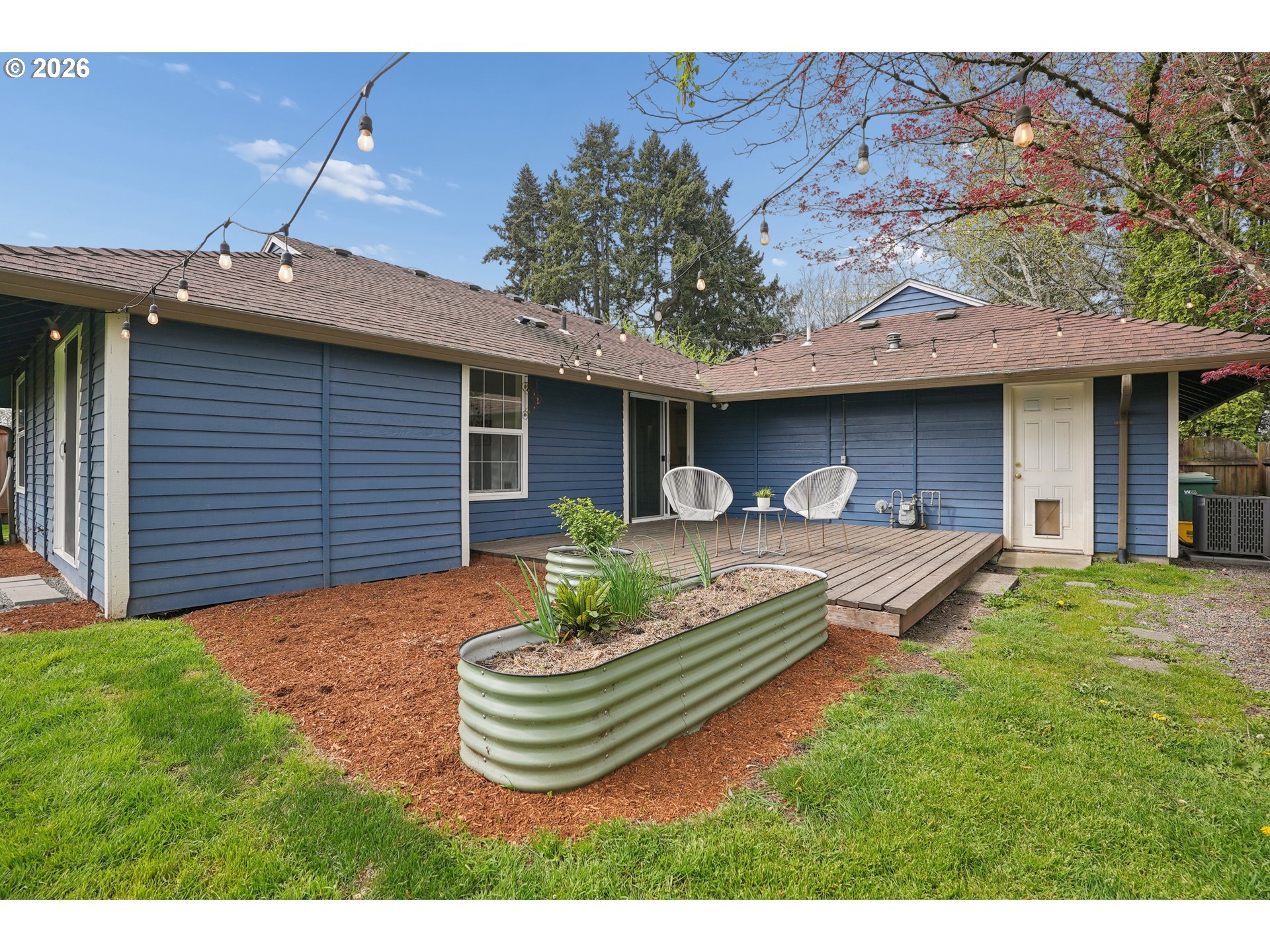 4030 Southwest 188th Avenue Beaverton, OR 97078 - Photo 14 of 20 a front view of a house with garden