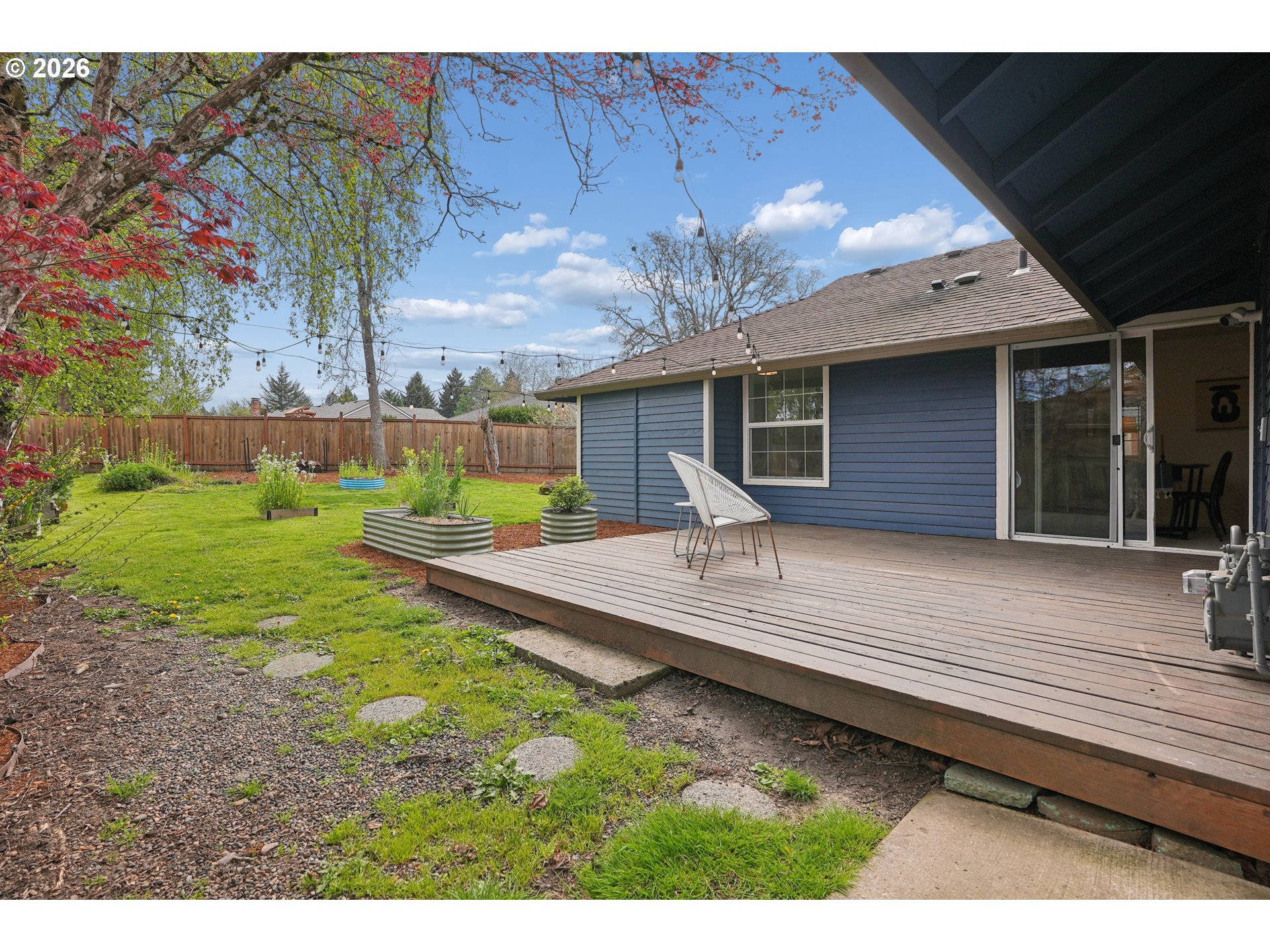 4030 Southwest 188th Avenue Beaverton, OR 97078 - Photo 15 of 20 a view of a house with a backyard