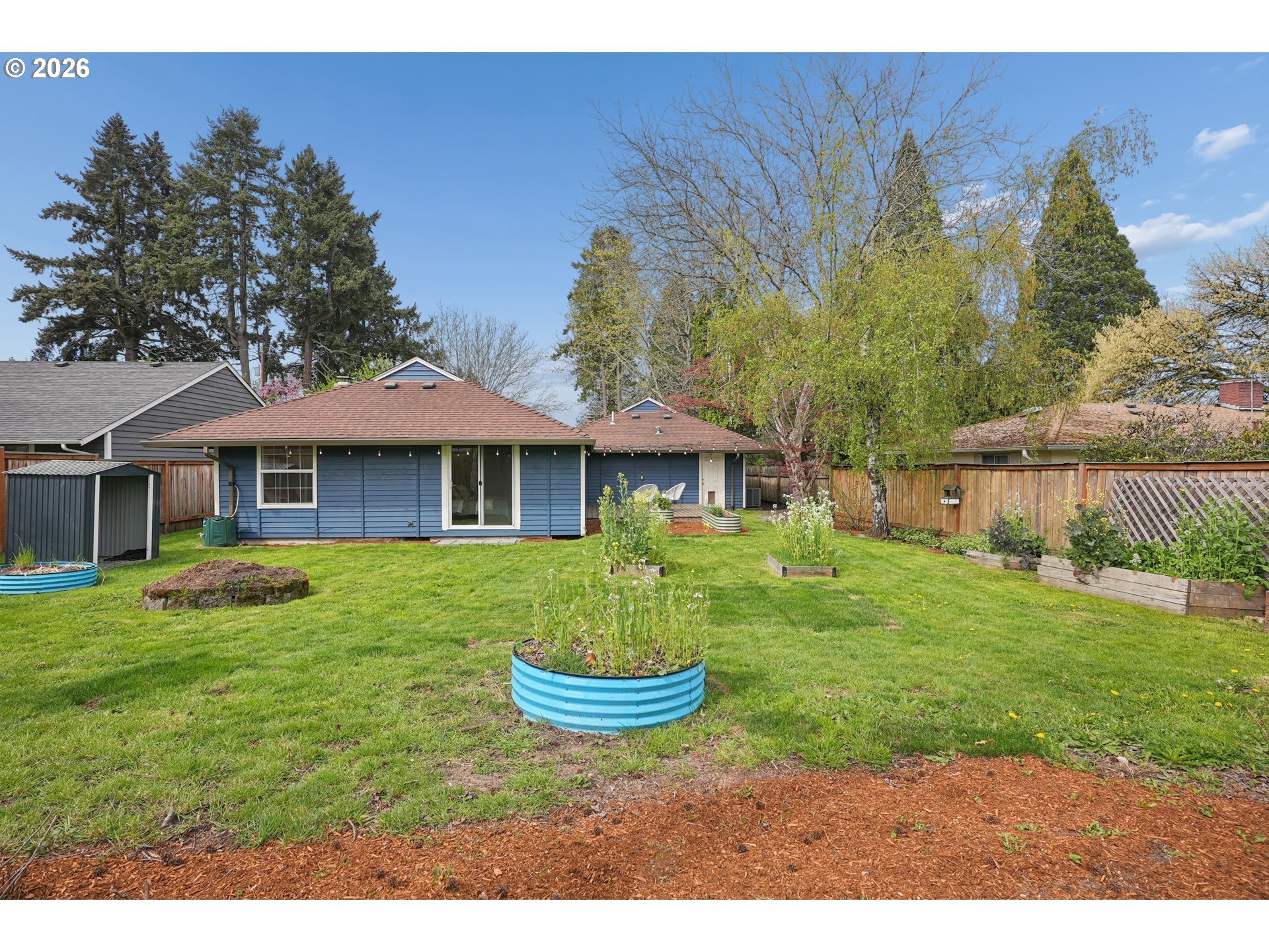 4030 Southwest 188th Avenue Beaverton, OR 97078 - Photo 17 of 20 a front view of a house with a yard