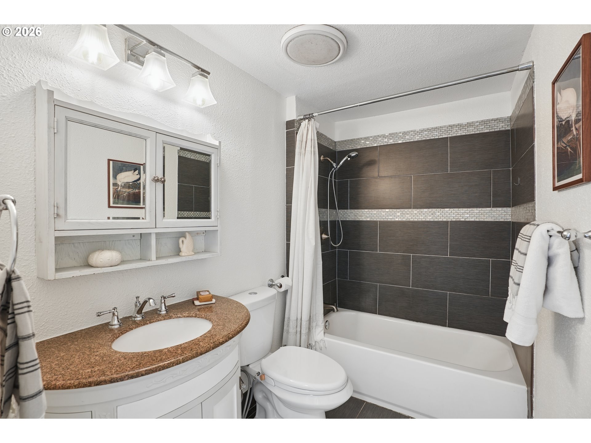 4030 Southwest 188th Avenue Beaverton, OR 97078 - Photo 10 of 20 a bathroom with a sink a toilet and shower