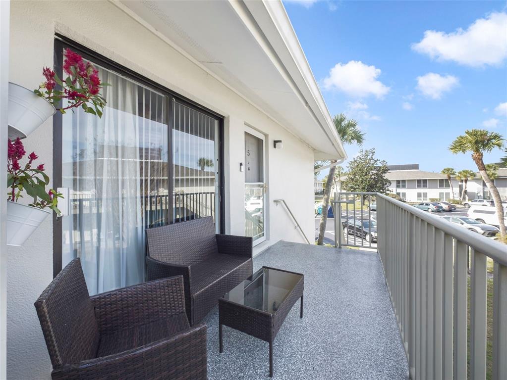 1935 South Conway Road, Unit F5 Orlando, FL 32812 - Photo 17 of 20 a living room with furniture and a potted plant