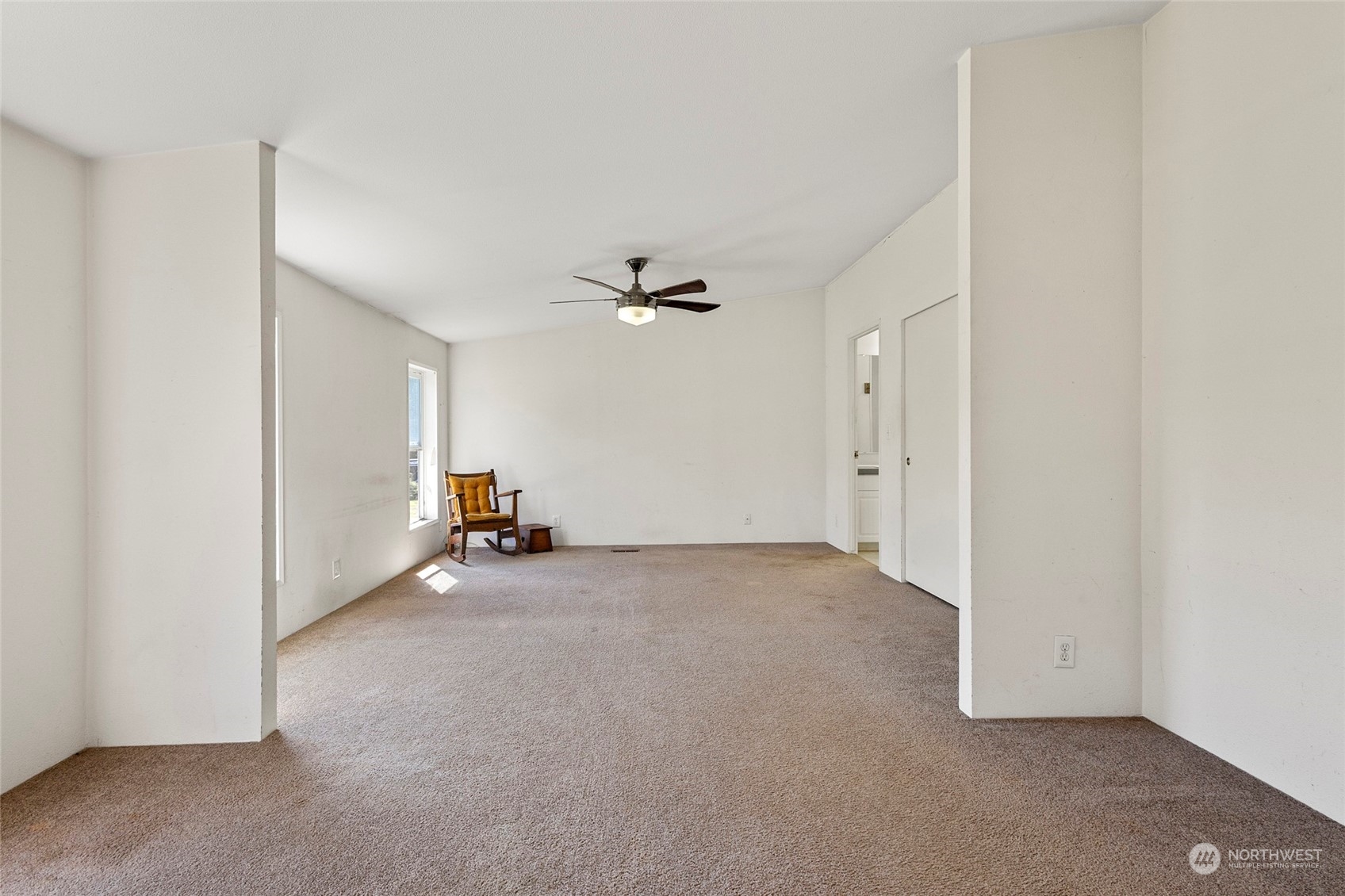 8292 Emmanuel Drive Concrete, WA 98237 - Photo 22 of 40 a view of a livingroom and a ceiling fan