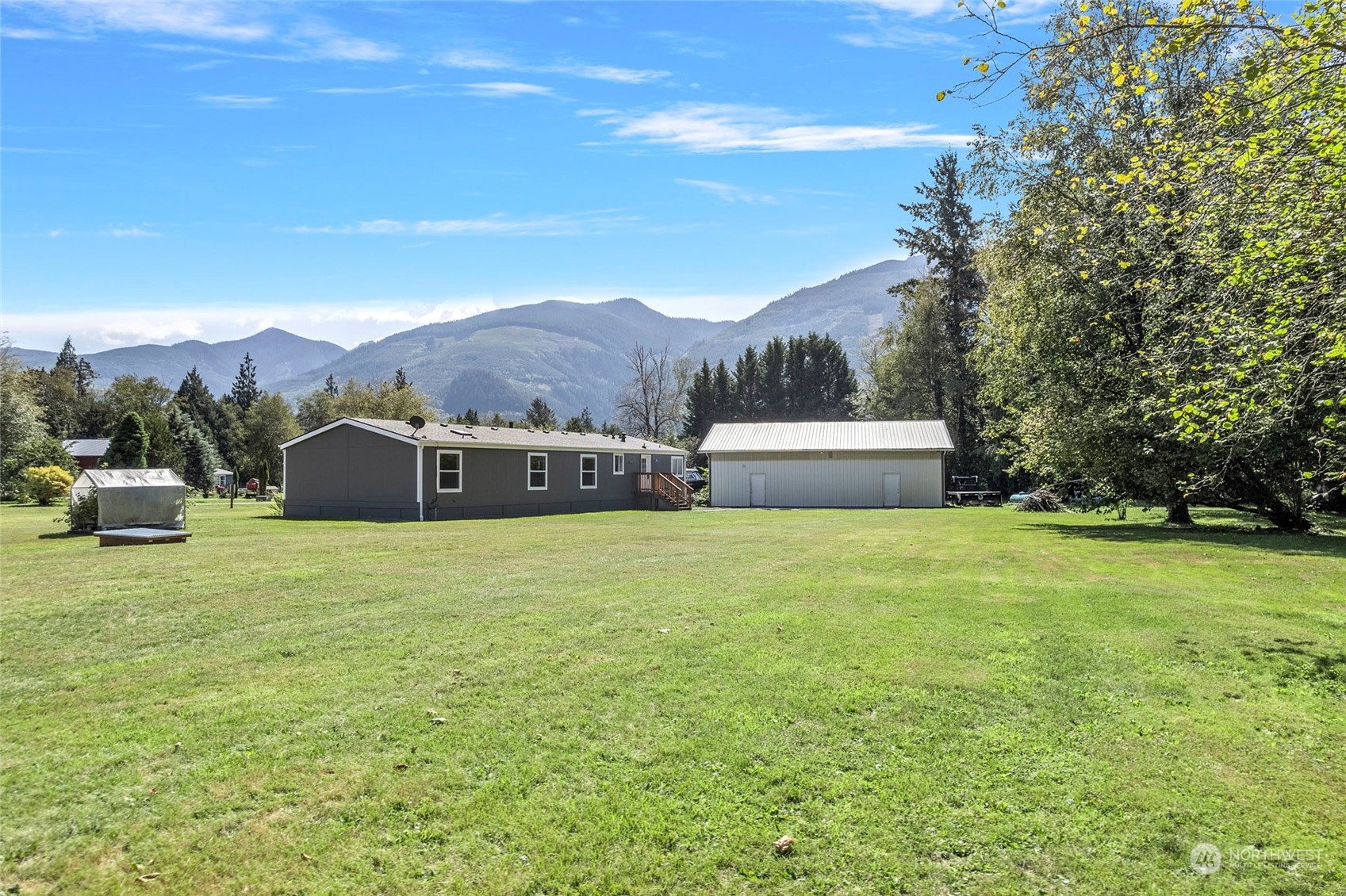 8292 Emmanuel Drive Concrete, WA 98237 - Photo 31 of 40 a view of an outdoor space and a yard